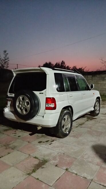 Mitsubishi: Mitsubishi Pajero iO (GDI) – kompakt 4x4 SUV - Kuzov: 5 qapılı, ağ — 3