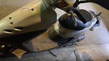 devo tiko: Скутер Honda Dio (серебристый) - Компактный городской скутер с — 1