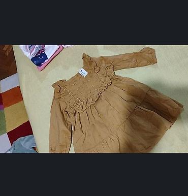 Kompleti: Paket za devojcice uzrasta 6-9 meseci. Od svih komada nosen je braon — 7
