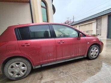 nissan tiida: Üzərində yüngül sürtunme var belə heç bir problem yoxdur