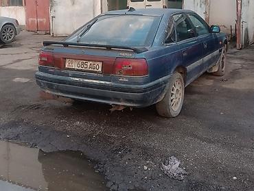 a8 d2: Mazda 626: 1988 г., 2.2 л, Бензин — 1