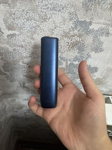 siqaret qiymətləri: **IQOS elektron siqaret cihazı** Tünd göy rəngli IQOS cihazı. Kompakt — 1