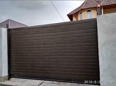 Откатные ворота: Откатные и секционные ворота из сэндвич‑панелей - Типы: откатные — 1