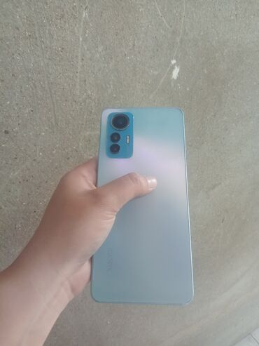 айфон 12 про макс: Xiaomi 12 Pro, 128 ГБ, цвет - Синий, 
 Отпечаток пальца, Две SIM карты