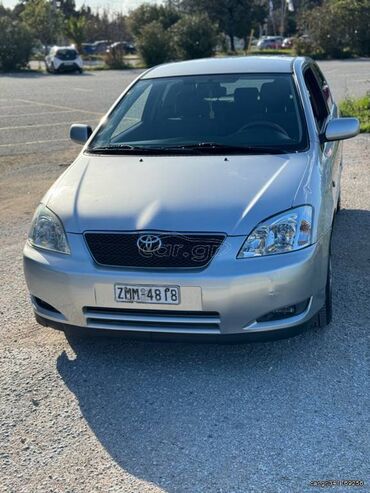 Transport: Toyota Corolla: 1.4 l | 2004 year Coupe/Sports