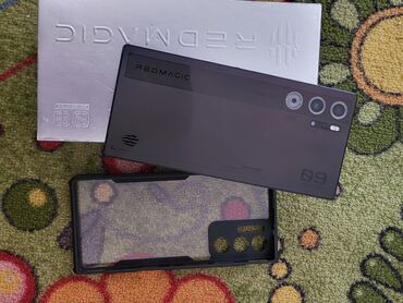 купить сенсорный телефон недорого: Игровой смартфон Nubia RedMagic 9 Pro в черном корпусе, оснащенный