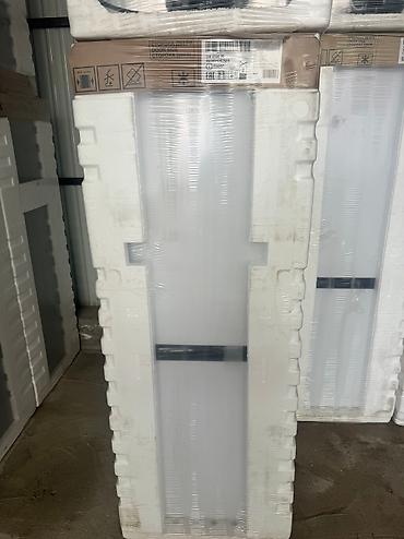 Холодильники: Холодильник Indesit, Новый, Двухкамерный, De frost (капельный), 60 * 185 * 60 — 9