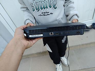 playstatio 3: Ps3 Slim 500 yaddaş.Praşivka 70ə yaxın. oyun.Donmur qızmır. İki — 2