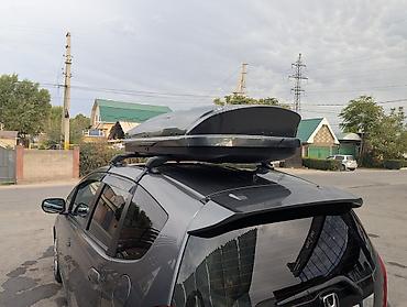 автобокс: Автобокс на крышу автомобиля - Тип: багажный бокс на крыше, крепление — 2