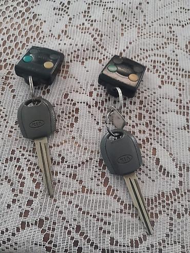 cherry masin: Kia Sportage – qara rəngli, şəhər və yolsuzluq üçün əlverişli kompakt — 9