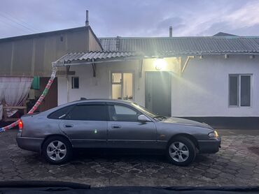 Mazda: Mazda 626: 1994 г., Хэтчбэк — 3