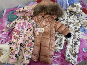 Верхняя одежда: Продаю комбезы, цена договорная, состояние отличное