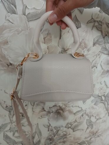 Классические сумки: Сумочки.
Разного цвета белый, бежевый и черный — 8