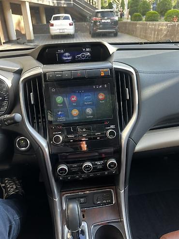 Другие детали салона: Subaru Ascent (интерьер 7‑местного внедорожника/кроссовера) — богатая — 3