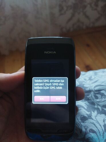 Nokia: Nokia Asha 308. İşlek veziyyetdedi problemi yoxdu.Boş adamlar narahat