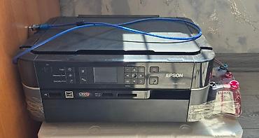 printer rəng: Epson markalı çoxfunksiyalı printer. Bu model çap, skan və — 2