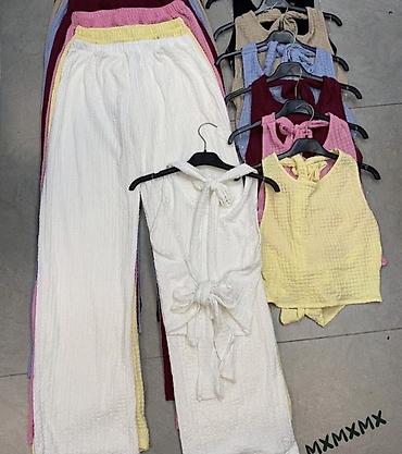 Kompleti: Ženski komplet – top bez rukava + široke pantalone. - Top: pripijena na lalafo.rs — 8 Kompleti: Ženski komplet – top bez rukava + široke pantalone. - Top: pripijena — 8