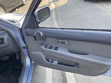 Унаа сатуу: Nissan Март: 2001 г., 1 л, Автомат, Бензин, Универсал — 9