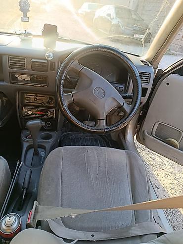 devo tiko: Mazda Demio: 1999 г., 1.3 л, Автомат, Бензин, Хэтчбэк — 5