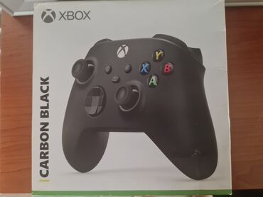 oyun consolu: Xbox uçun joystik satilir.Ela veziyyetdedi,heç bir problemi