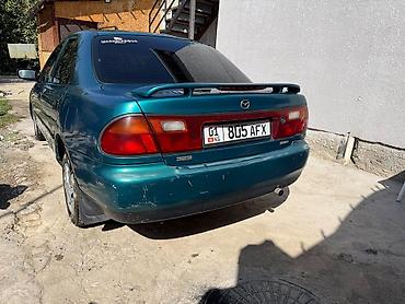 рама газ 52 53: Mazda 323: 1996 г., Механика, Бензин, Седан — 4