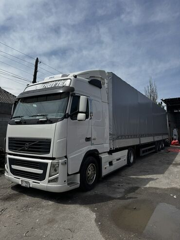 тракторго прицеп: Сүйрөгүч, Volvo, 2012 г., Тенттелген