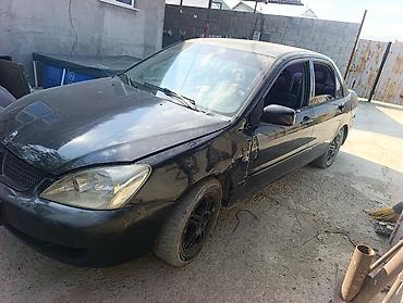двери виш: Авторазбор Mitsubishi Lancer (седан, поколение 2003–2007). 1.6 бензин — 4