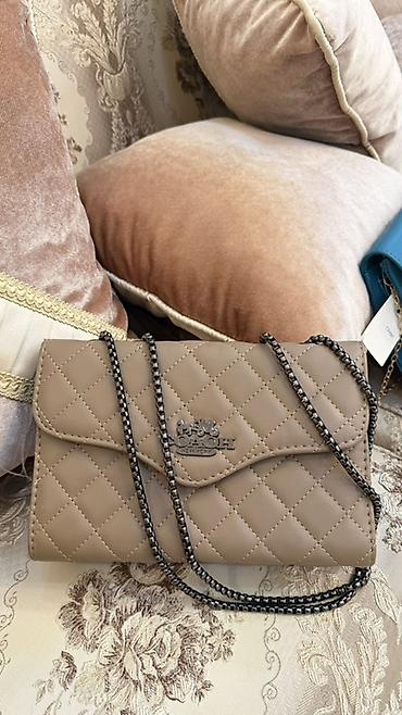 coach canta: Təsvir: - Brend: Coach (loqo ön hissədə metal emblem ilə) - Model — 3