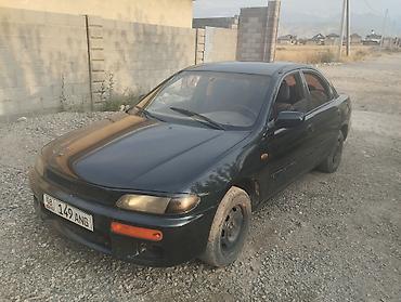 Унаа сатуу: Mazda 323: 1996 г., 1.8 л, Кол менен иштөөчү, Бензин, Седан — 1