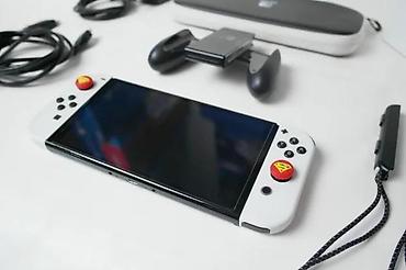 Nintendo Switch: U ponudi je Nintendo Switch OLED (čipovan). Memorija: 256 GB + 64 GB — 6