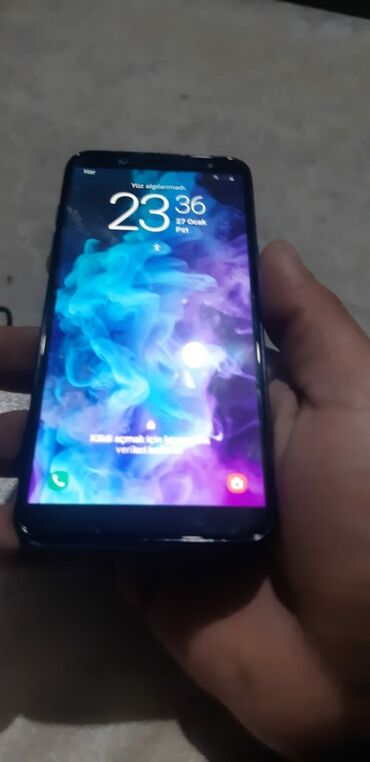 tikiş maşını ustası: Samsung Galaxy A6, 32 GB, rəng - Göy, Barmaq izi, İki sim kartlı, Face ID