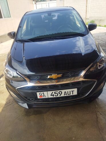 шевроле 7 мест: Компактный автомобиль Chevrolet Spark черного цвета. Подходит для