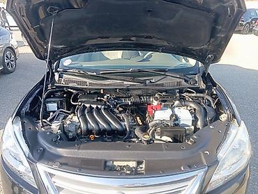 Nissan: Nissan Sentra SV sedan - Korpus: qara rəng, 4 qapılı sedan, xrom ön — 3