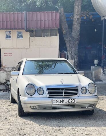 depazitle masin: Mercedes-Benz 200: 2 l | 1998 il Sedan