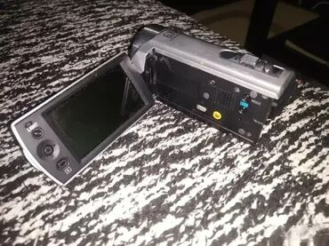 Video kamere: 1. Kamkorder Sony Handycam Dcr-Sx21 siva 2. Sony DCR-HC51E Camcorder — 7