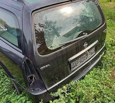 polovne gume type 1: GEPEK VRATA KARAVAN VISE BOJA ZA OPEL ASTRA G | Svi delovi za Opel — 1
