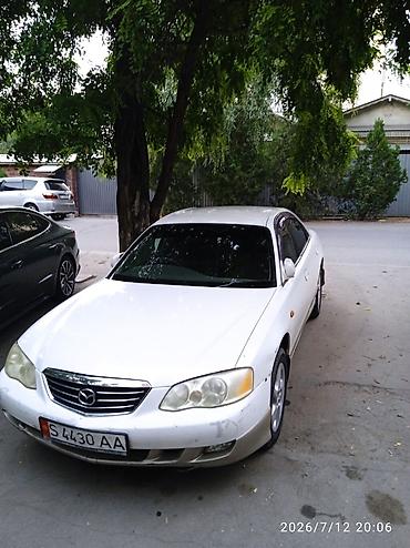 жена: Mazda Millenia: 2001 г., 2 л, Автомат, Бензин, Седан — 4