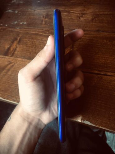 Adapterlər: Xiaomi Redmi smartfon (mavi) - Model: Redmi (arxa qapaqda Redmi