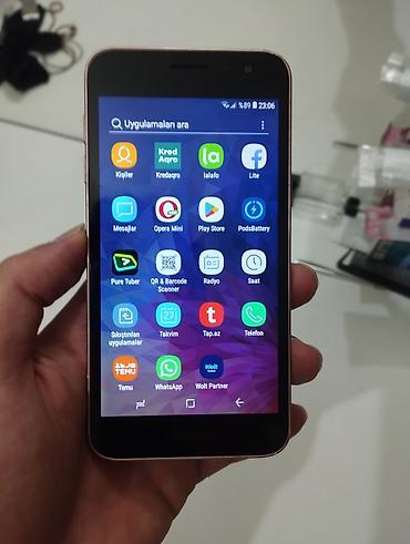 ses ucaldan: Samsung Galaxy J2 Core, 8 GB, rəng - Qızılı — 8