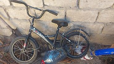 Uşaq velosipedi – 20 sm-li (təxminən 12–16 düym) təkərlər, BMX tipli