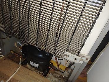 soyuducu axtarıram: Məişət soyuducusunun arxa hissəsi – kompressor və kondensor radiatoru — 1