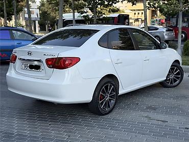 bmw e 38: Hyundai Elantra: 2 l | 2009 il Sedan — 8