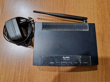 huawei adsl modem: Рабочий модем Zyxel p-600. 4 порта, ADSL 2+, wi-fi 802. производство