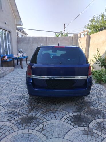 Opel: Opel Astra H Caravan (universal), göy rəng. - Kuzov: universal — 5