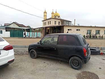 Daihatsu Cuore: 2001 г., 1 л, Механика, Бензин, Купе