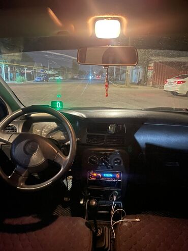 продам машину с последующим выкупом: Хэтчбек Daihatsu kuore синего цвета. Модель представлена пятидверным
