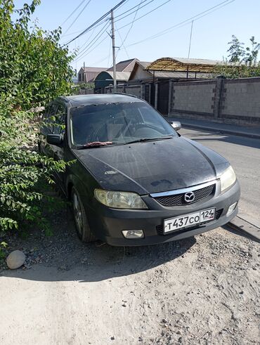 электромобиль neta: Mazda 323: 2003 г., 2 л, Автомат, Бензин, Хетчбек