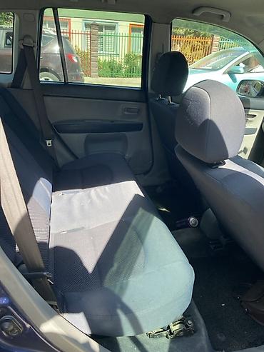 wuling mini ev: Mazda Demio: 2003 г., 1.3 л, Автомат, Бензин, Хэтчбэк — 6