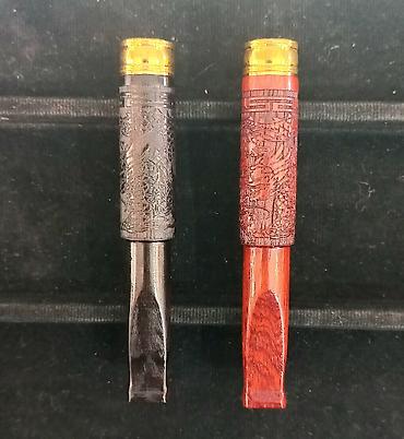 Зажигалки: Элегантный мундштук для сигарет, выполненный в темных тонах, с — 8