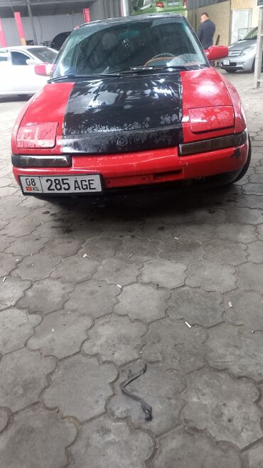 Mazda: Mazda 323: 1991 г., 1.6 л, Механика, Бензин, Хэтчбэк